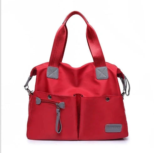 Versatile ladies handbag in various colors with multiple carry options, including handbag, shoulder bag, and crossbody styles, featuring durable construction and organizational pockets.