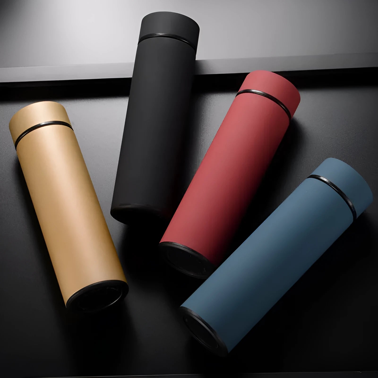 450ml stainless steel vacuum insulated water bottle in black red gold or blue colours