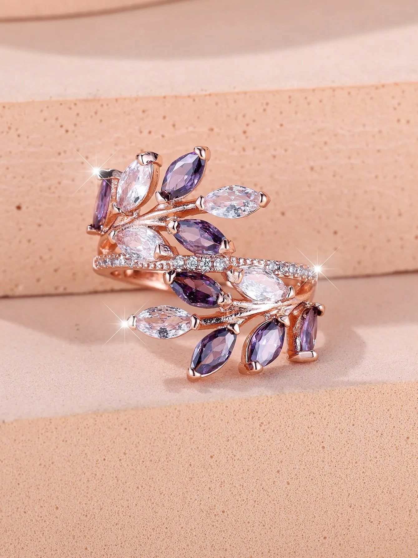Horse Eye Zircon Leaf Ring with adjustable opening in rose gold purple white diamond colour on a hand