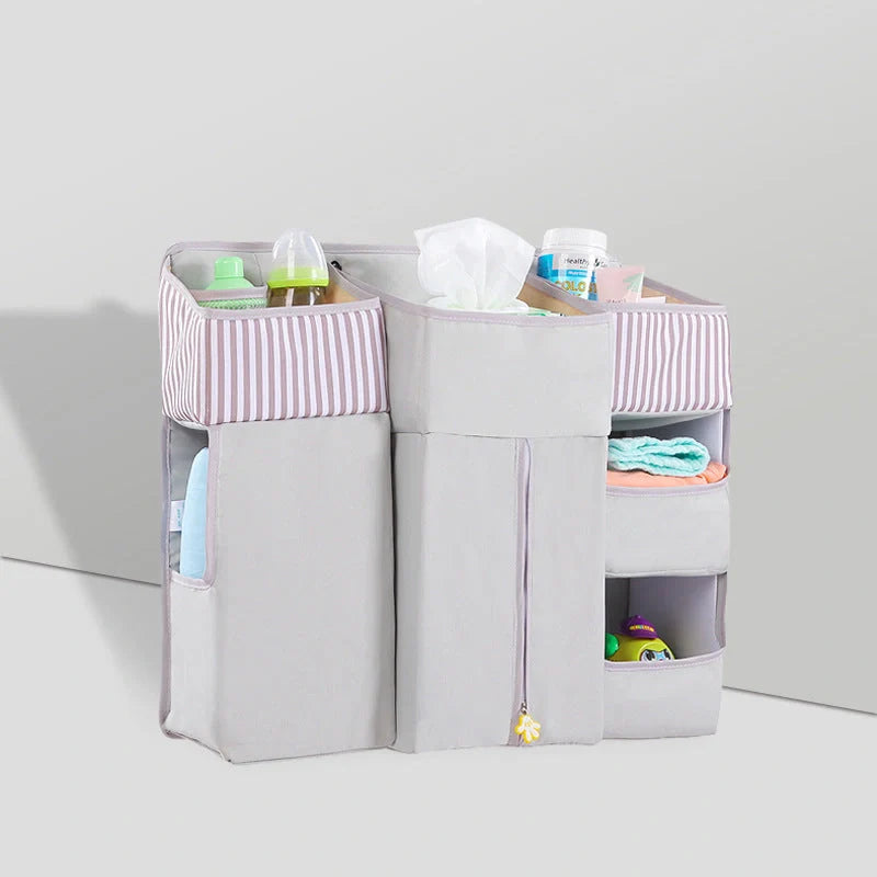 Universal baby crib hanging storage bag in various colors with multiple pockets
