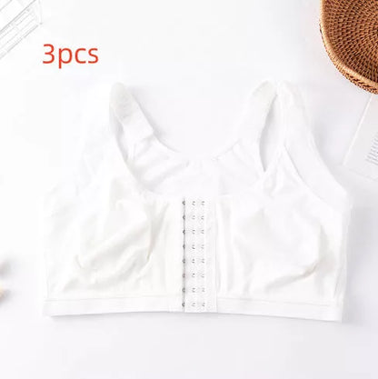 Plus-size front buckle sports bra in white, black, and apricot
