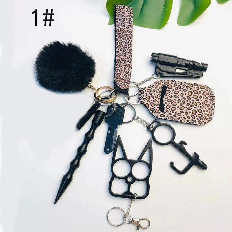 Self-defense keychain set for women with 11 safety tools including alarm and window breaker