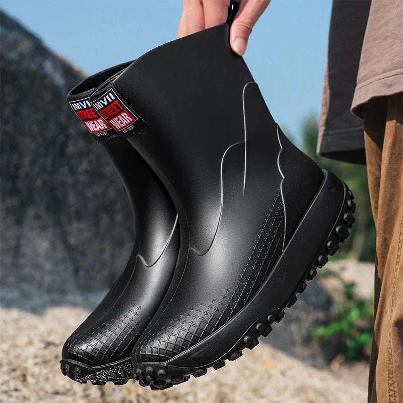 Men's mid low tube rain boots in black red colour with round toe and plastic soles