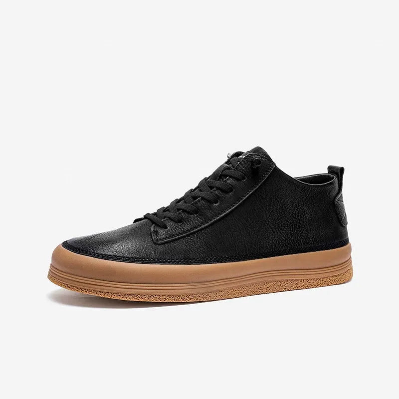Men's black casual shoes with round toe, lanyard closure, and soft rubber soles on a neutral background
