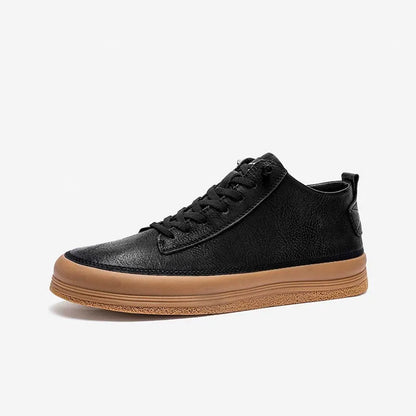 Men's black casual shoes with round toe, lanyard closure, and soft rubber soles on a neutral background