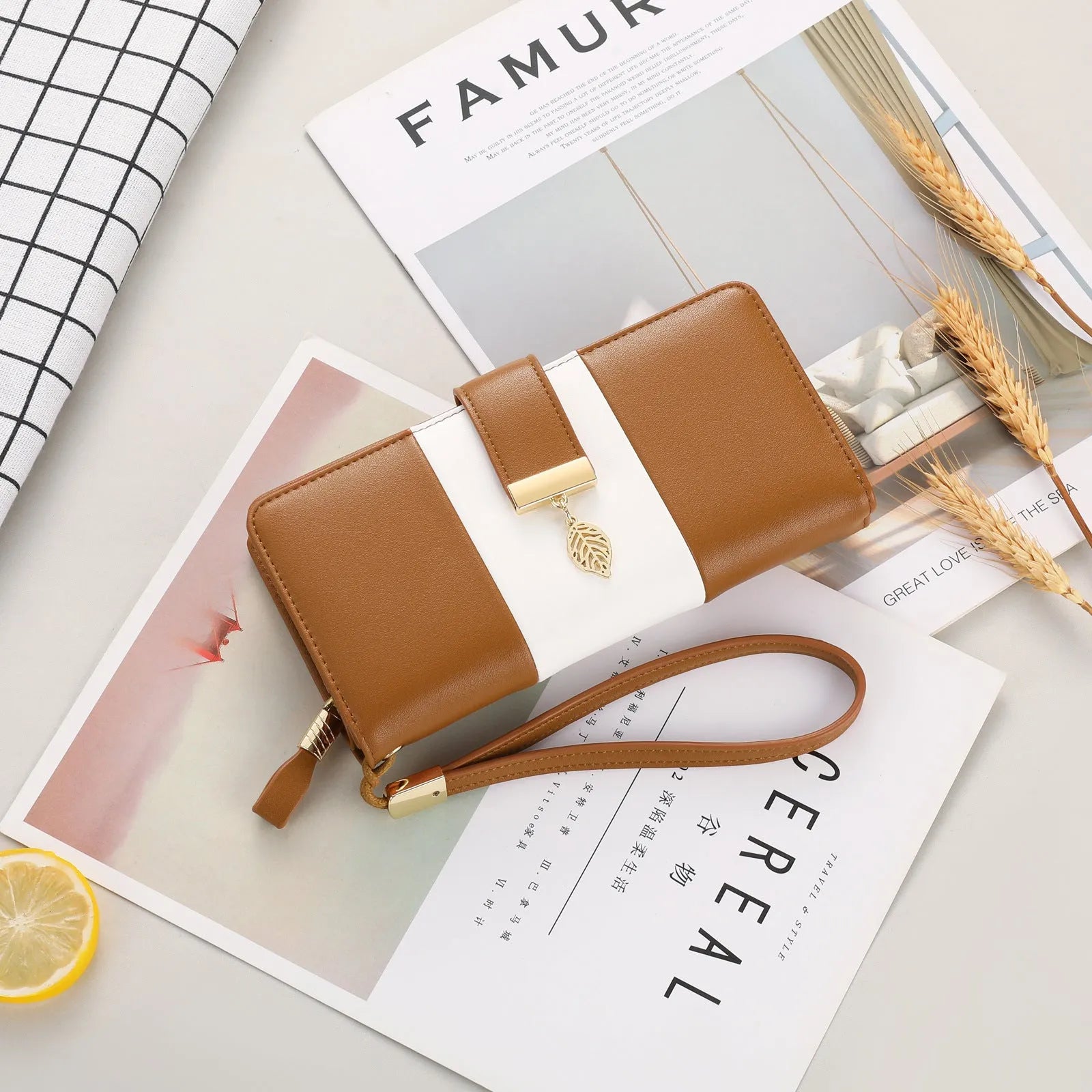 Anti-theft PU leather handbag with lock closure showing 19.5cm compact design