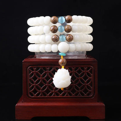 A long white jade Bodhi bead bracelet with 6x8mm beads, shown in various style options including cloisonne and lotus designs.