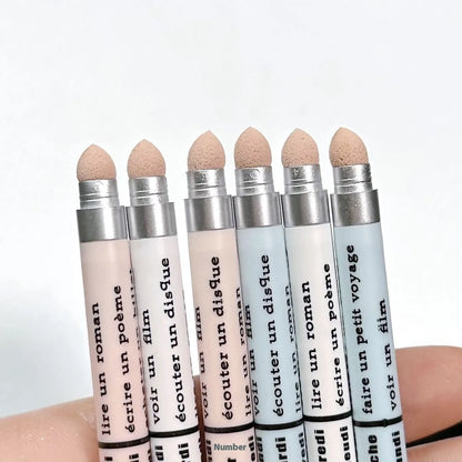 Dual-ended highlight brightening eyeliner pen showing precise tip and highlighter applicator, displayed with six colour options.