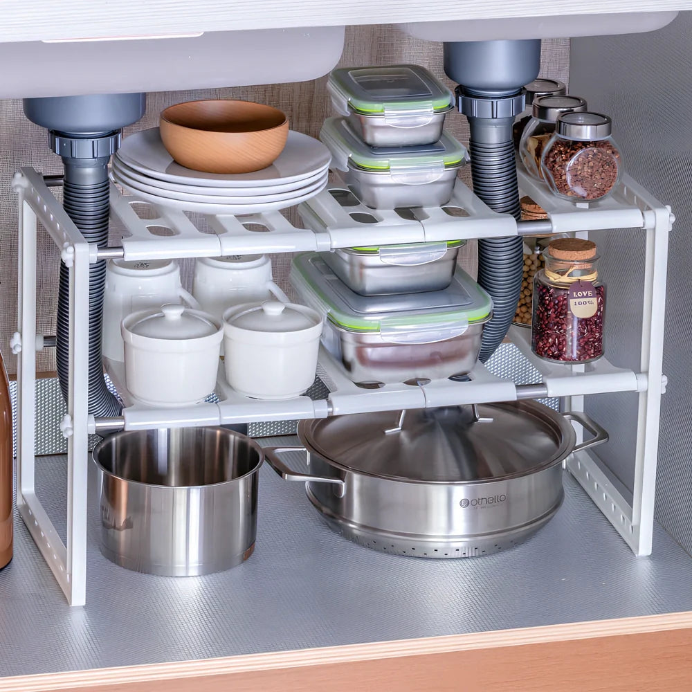 White retractable kitchen shelf with two tiers and adjustable length from 36cm to 70cm