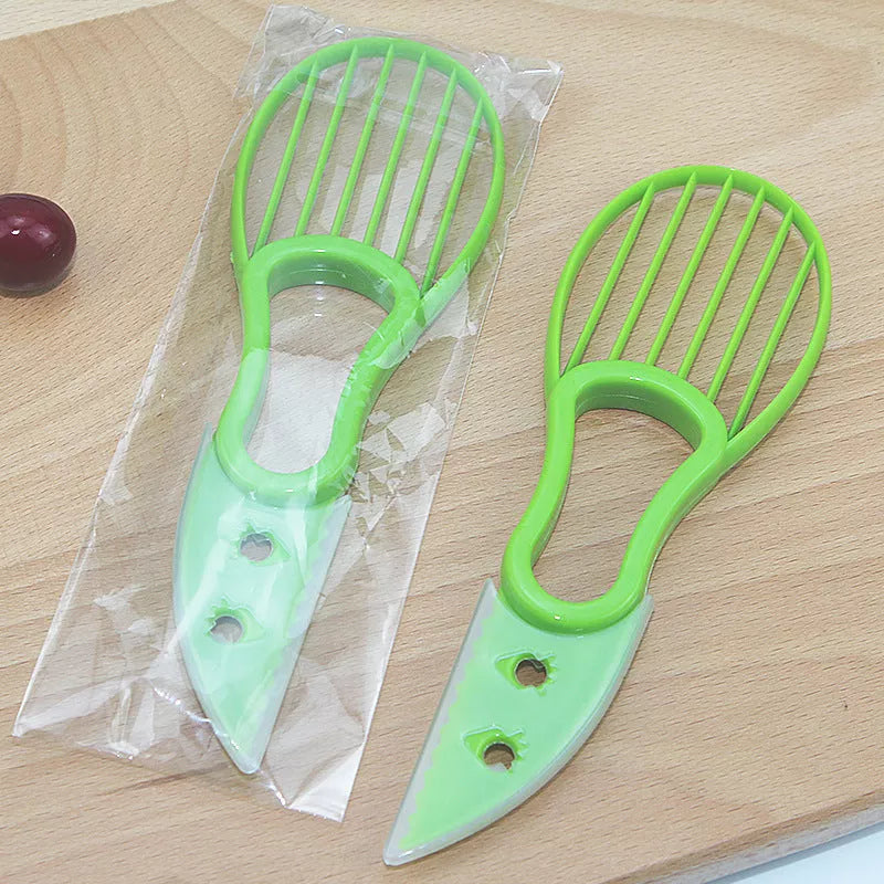 Multifunctional avocado knife in green and orange for slicing and peeling fruits