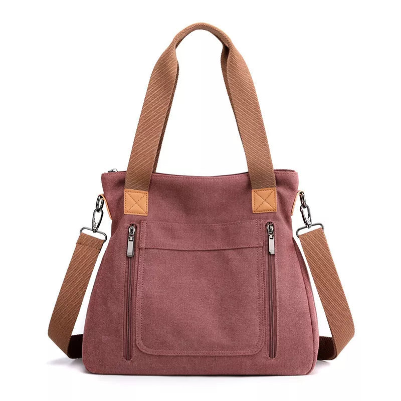 Women's canvas shoulder bag in various colors with large capacity and zipper closure