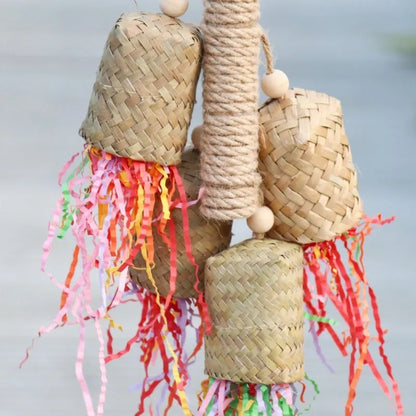 Wooden parrot chew toy with colourful shredded paper measuring 15x35cm