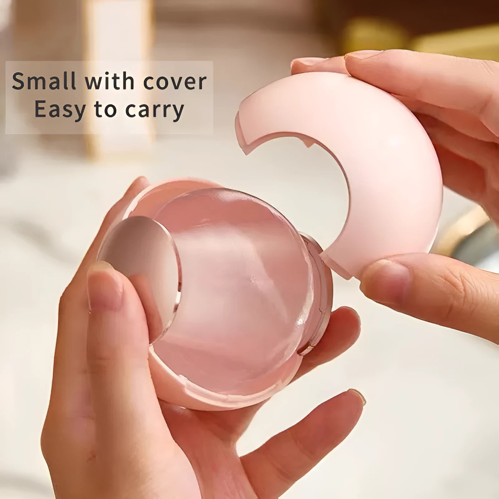 White, pink, green, and deep pink coloured ABS hair removal ball with a handle for pet hair and lint.