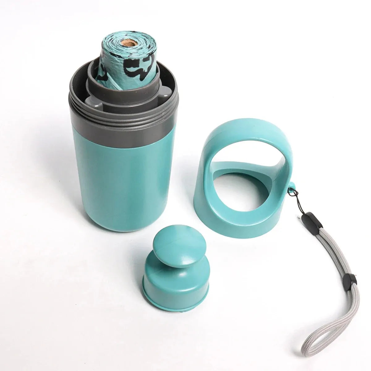 Blue portable claw-style dog pooper scooper with a roll of disposable bags for outdoor pet waste clean-up.