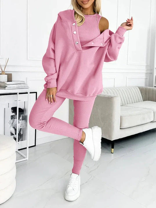 Women's 3-piece sports suit featuring a hooded sweatshirt with pockets and slim trousers