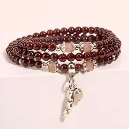 Wine red garnet crystal floral bracelet with Bohemian and ethnic design elements