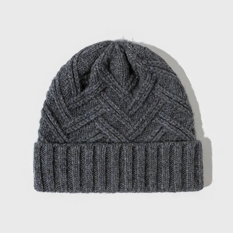 Wool knitted women's hat with dome crown in ankela red colour showing totem pattern details
