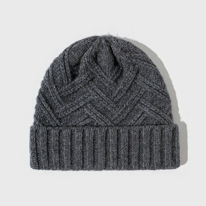 Wool knitted women's hat with dome crown in ankela red colour showing totem pattern details
