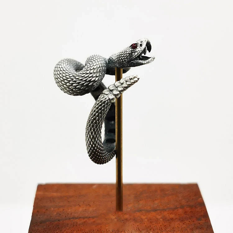 Adjustable snake ring with unique rattlesnake design in various color options, including white and black with open or shut mouth styles, and gold accents