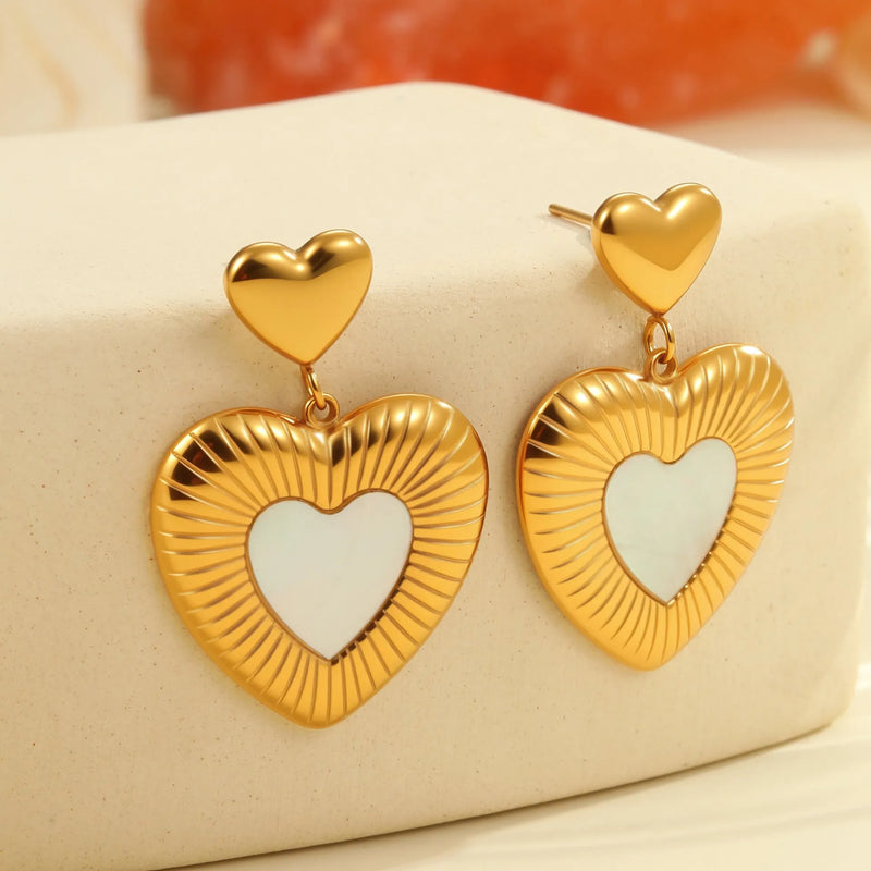 Stainless steel heart-shaped earrings featuring white fritillary design with gold-colour electroplating and 18K purity rating, suitable for women seeking fashion officewear jewellery with love-themed elements