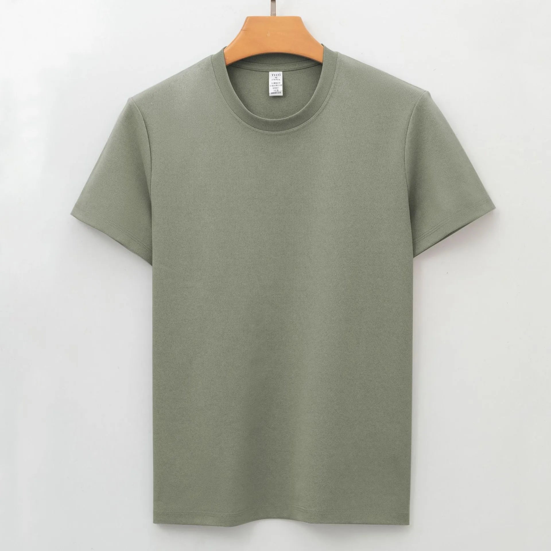 Men's solid colour antibacterial quick-dry short sleeve T-shirt on a hanger.