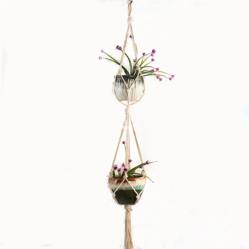 Woven wire lattice plant holder with natural cotton rope, shown in a rustic style supporting a green plant.