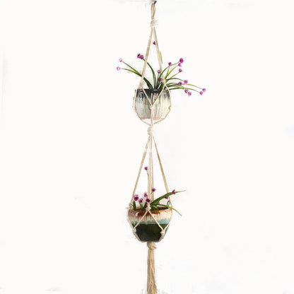 Woven wire lattice plant holder with natural cotton rope, shown in a rustic style supporting a green plant.