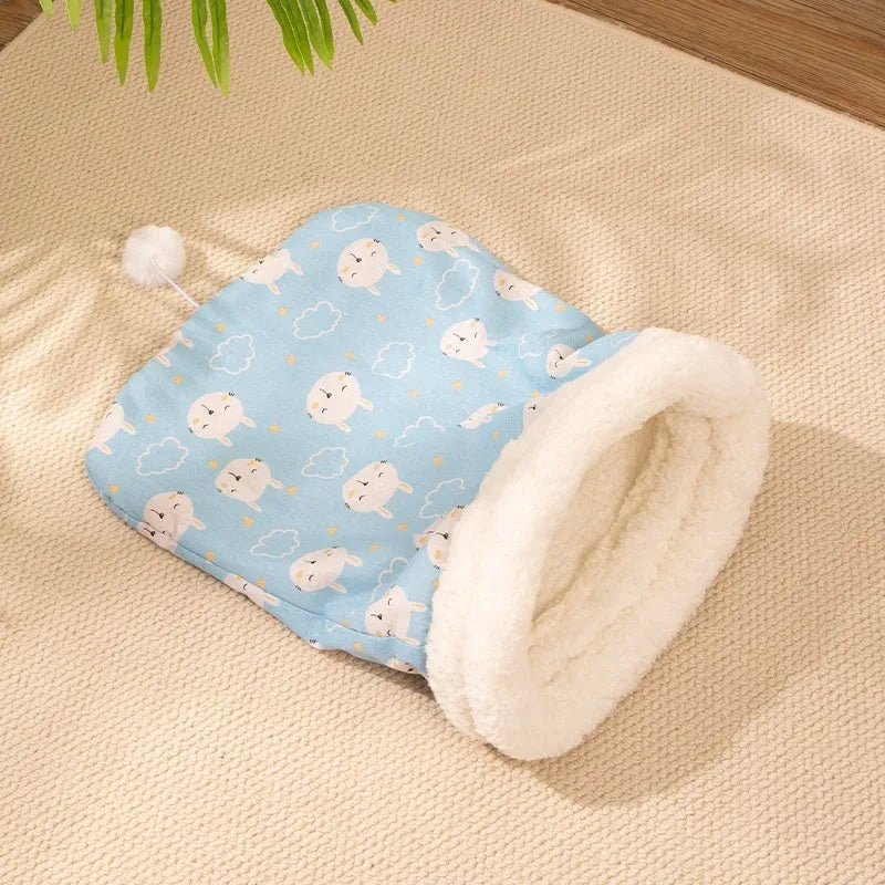 Pink flannel cat sleeping bag nest bed measuring 50 by 40 centimetres.