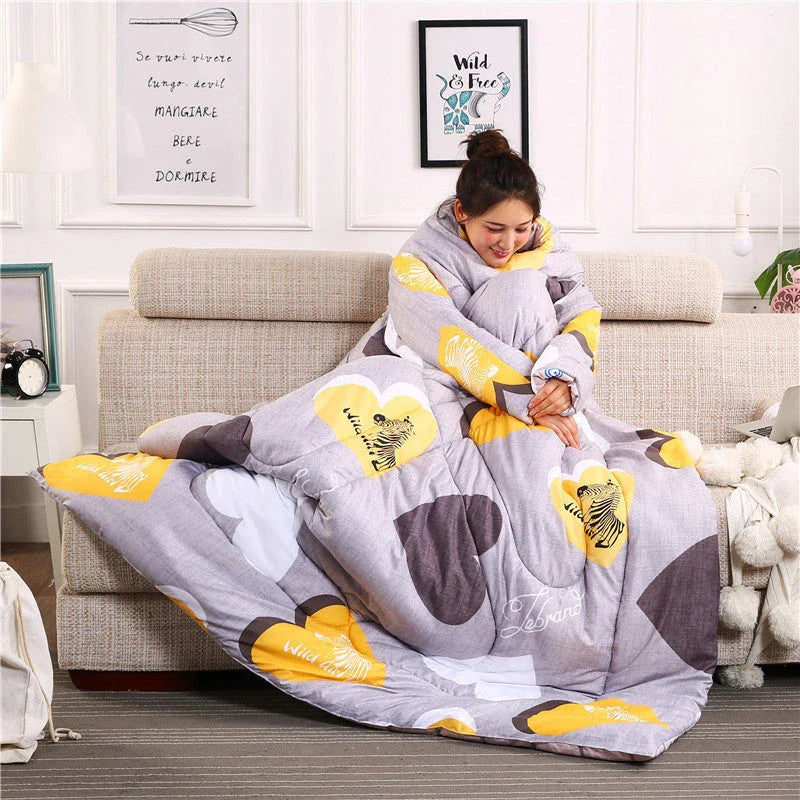 Cozy fleece blanket with sleeves in various colors, perfect for relaxing and enjoying indoor activities