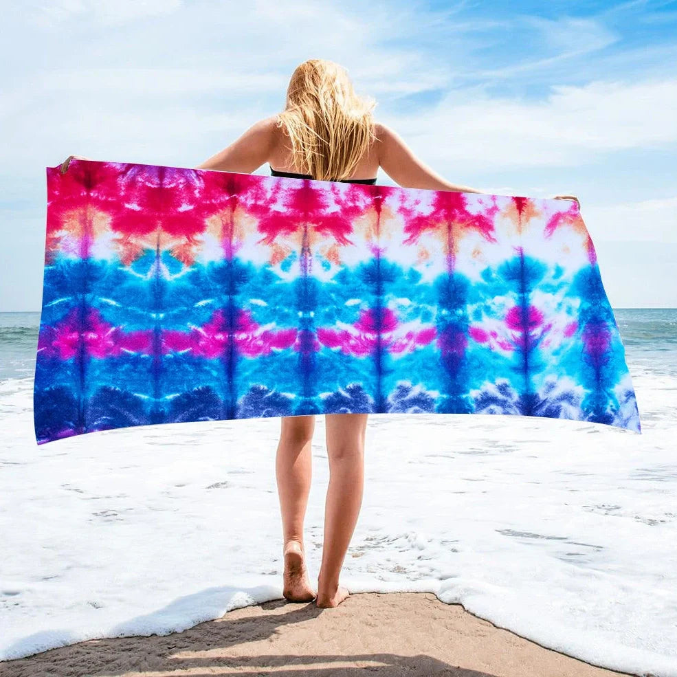 Square beach towel with tie-dye pattern showing superfine fibre texture and vibrant colours