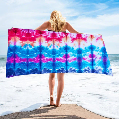 Square beach towel with tie-dye pattern showing superfine fibre texture and vibrant colours