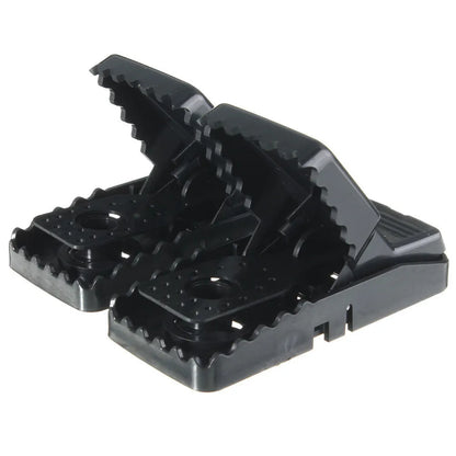 Six black plastic snapping mousetraps showing quick-kill mechanism and compact 11cm size