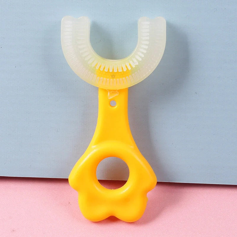 U-shaped baby toothbrush in soft silicone for kids, available in multiple colors