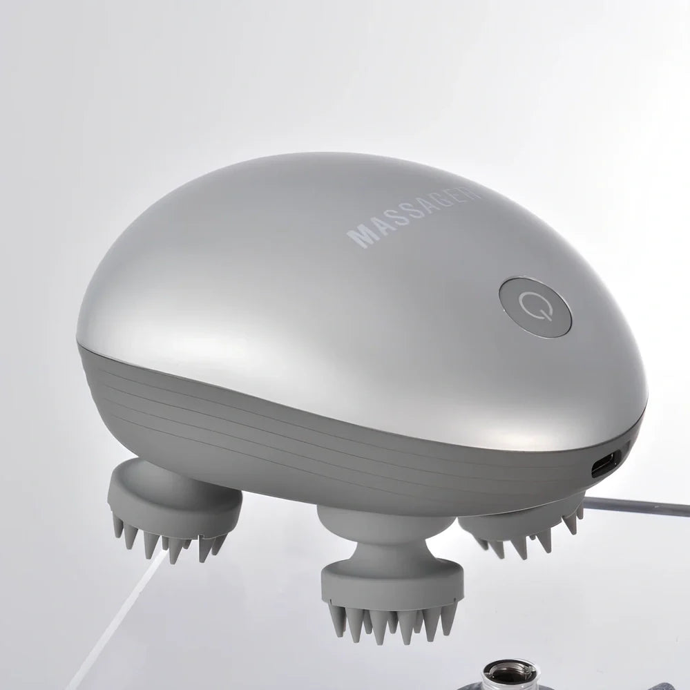 Automatic scalp massager with 8 blue silicone heads arranged in circular pattern on white background