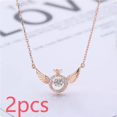 Angel Wings Necklace for women with adjustable water wave chain, available in gold, silver, and rose gold.