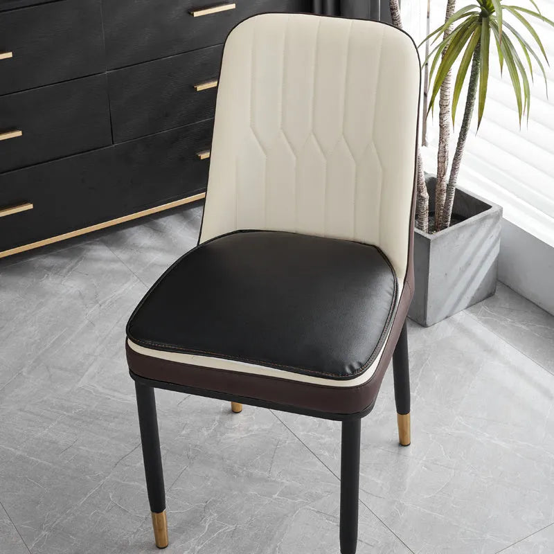 Leather horseshoe-shaped seat cushion in beige colour on a chair, showing non-slip base and 2.5cm thickness.