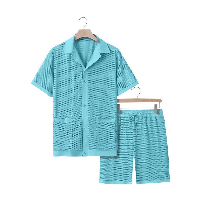 Women's lake blue see-through short sleeve cardigan and matching shorts beach cover-up set laid flat.