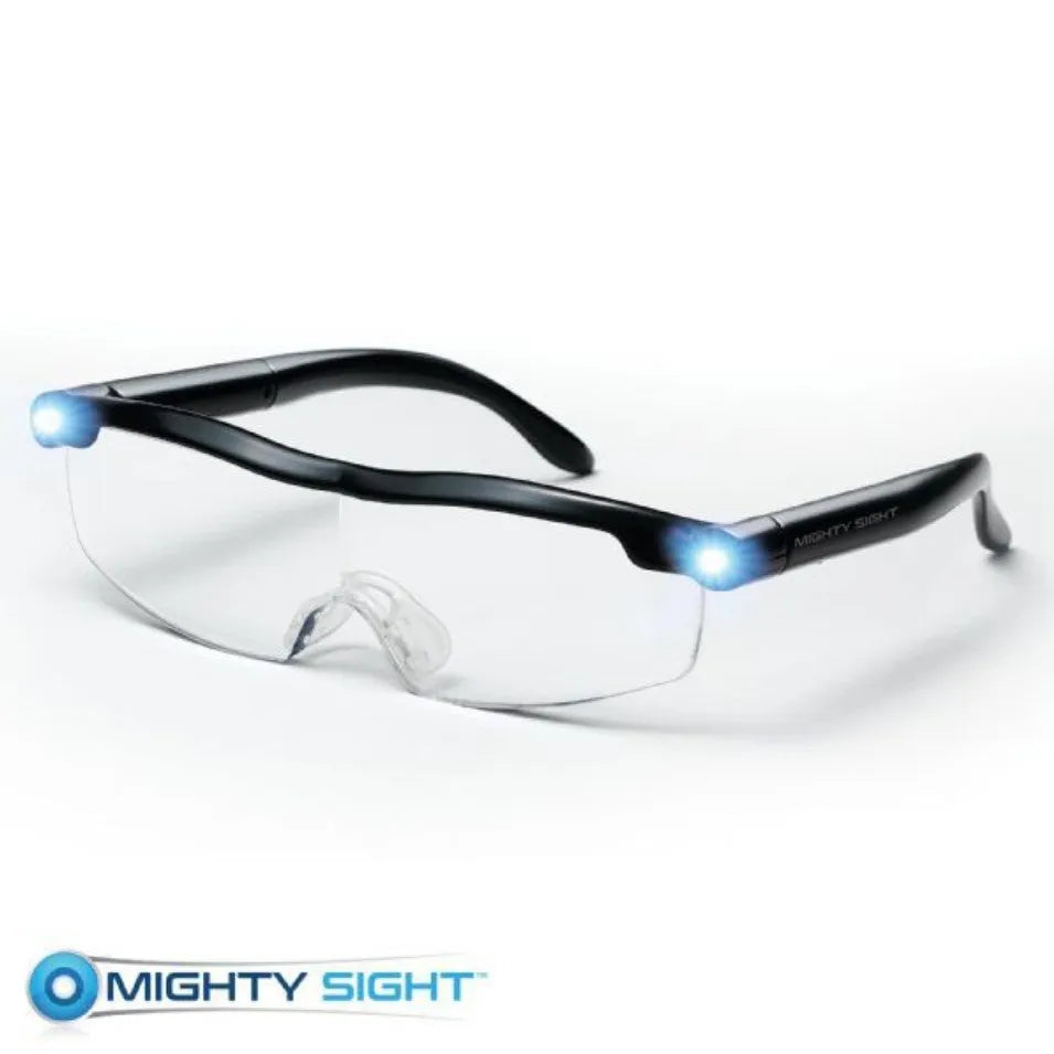 Transparent black USB LED reading glasses with integrated light on frame.