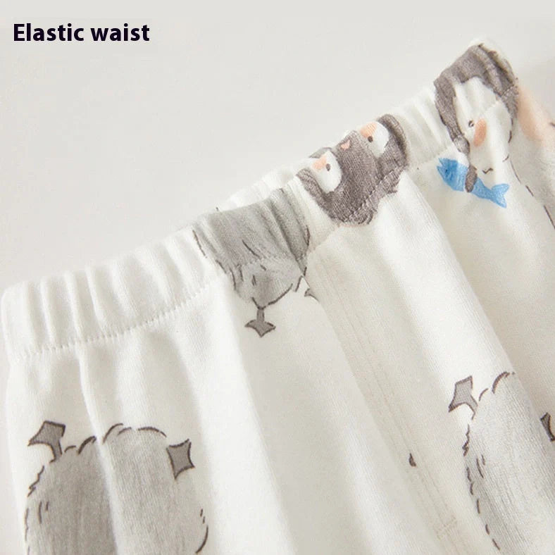 Cotton baby long johns set with penguin cartoon design, showing long sleeves and pants