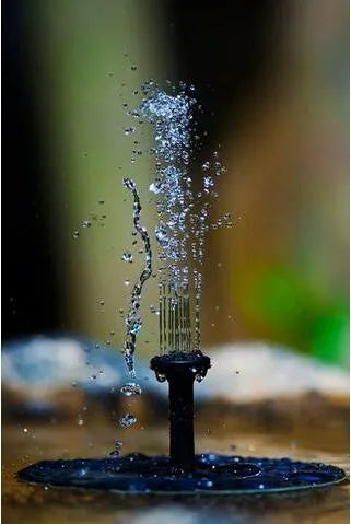Black solar floating fountain pump with 4 nozzle heads for garden ponds and birdbaths