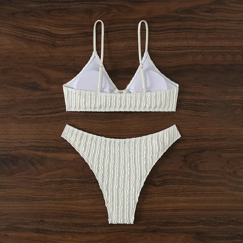 White women's V-neck beach split swimsuit with sleeveless design