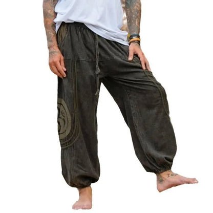 Dark green ethnic patterned men's trousers with ankle ties and mid waist fit