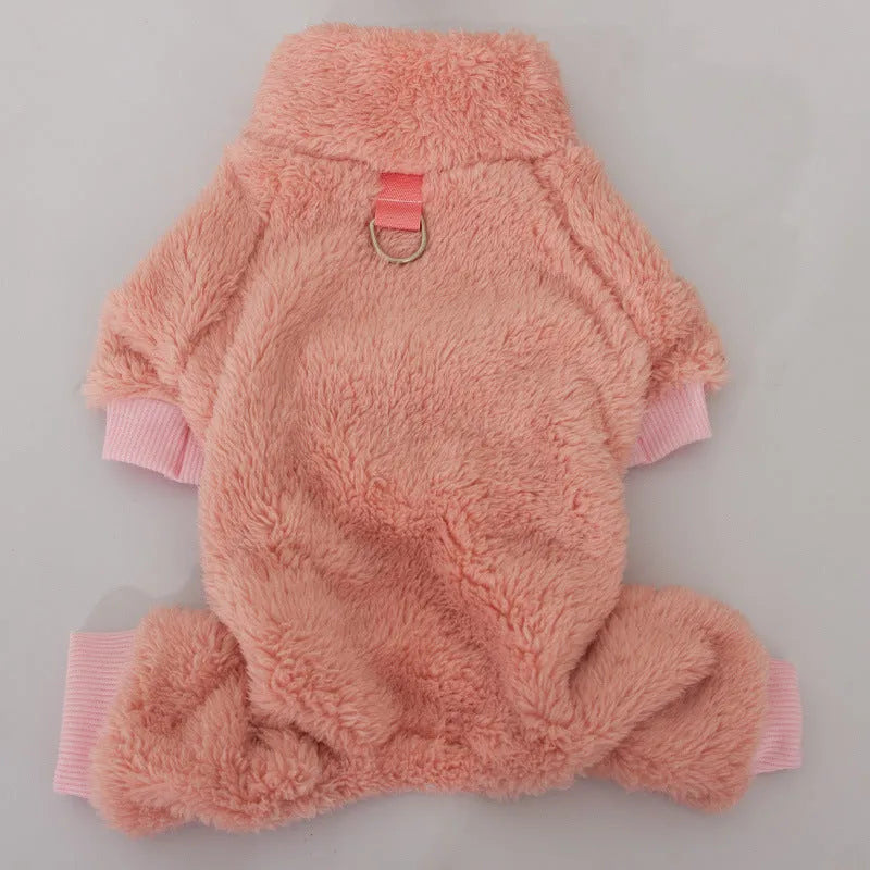 Blue double-sided plush four-legged dog clothing with high collar and towing ring laid flat.