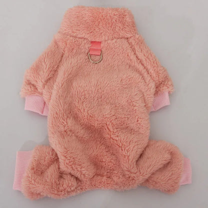 Blue double-sided plush four-legged dog clothing with high collar and towing ring laid flat.