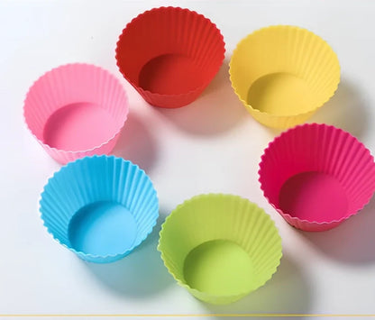 Six different coloured silicone cupcake liners showing fluted edges and nonstick surface