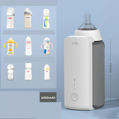 White digital display portable milk warmer with USB charger showing compact 85mm length design