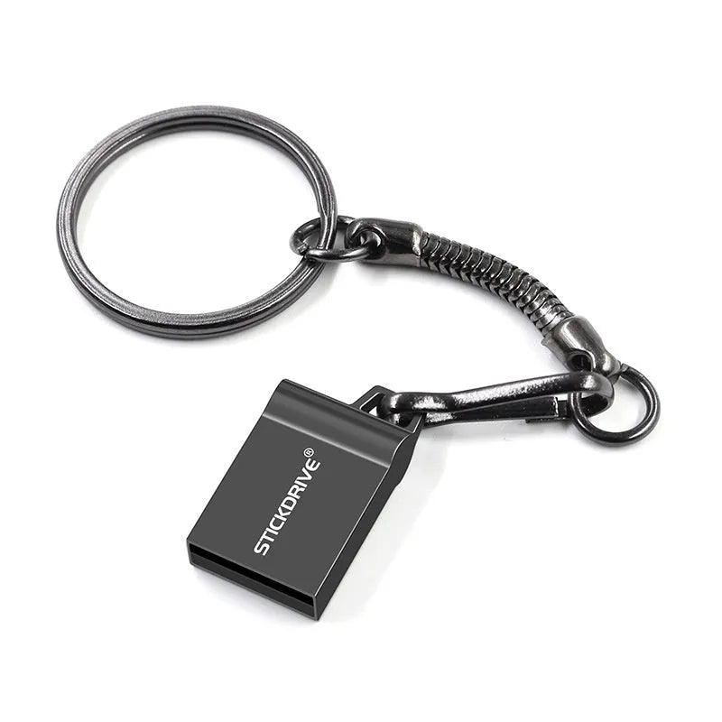 Silver metal USB flash drive with a carabiner keychain clip attached
