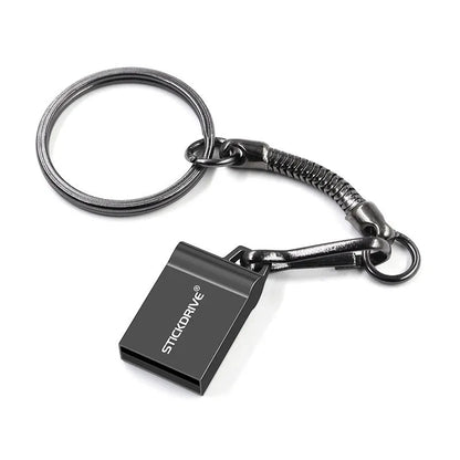 Silver metal USB flash drive with a carabiner keychain clip attached