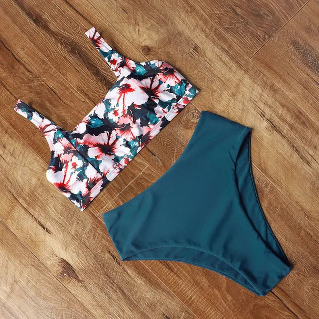 Women's leopard print high waist bikini swimsuit set on a mannequin, showing bra and briefs.