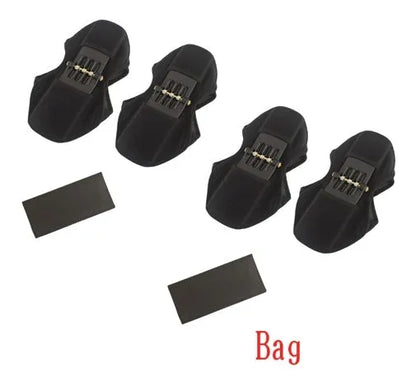Adjustable spring knee brace for sports support in black, shown with straps.